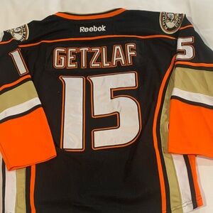 Reebok Black and Orange Sports Jersey